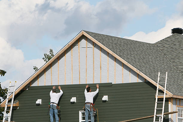 Professional Siding technician working in Harwinton, CT